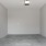 a room with a grey carpet