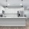 a kitchen with white cabinets