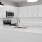 a kitchen with white cabinets